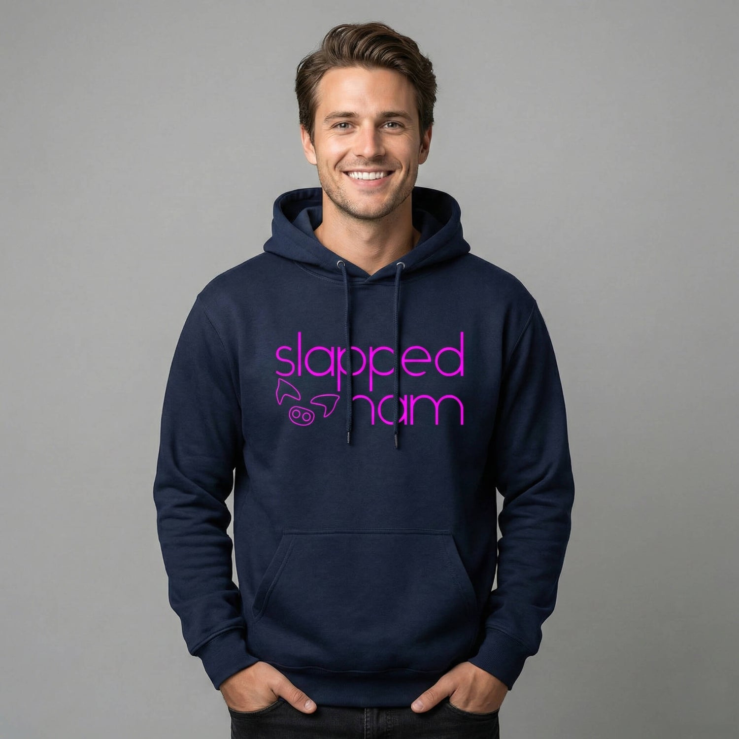 Man wearing a navy blue hoodie with 'slapped ham' text on a navy blue background