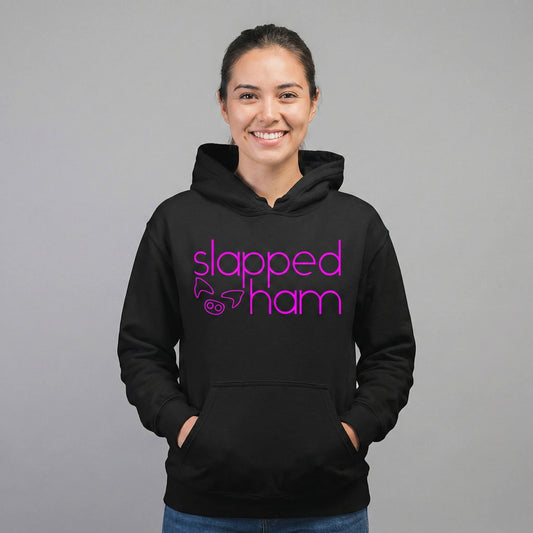 Woman wearing a black hoodie with 'slapped ham' text on a black background