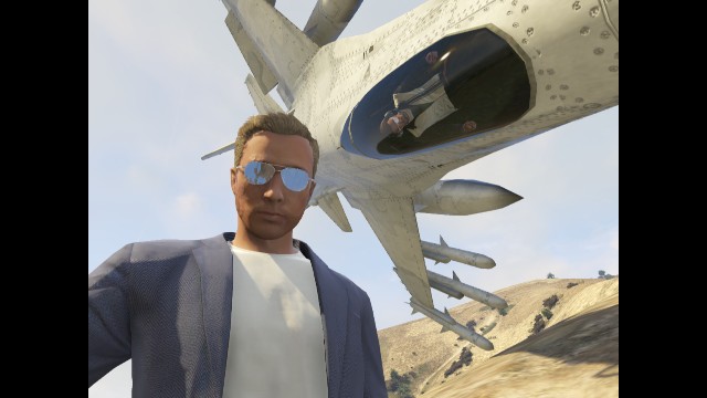 Man taking a selfie with an upside down jet on GTA V. 