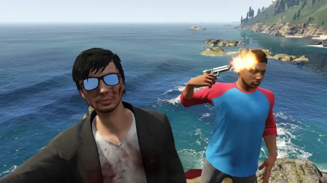Man taking a selfie as his friend shoots himself on GTA V.