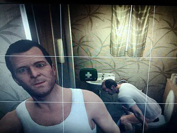 Michael taking a selfie with Trevor on the toilet on GTA V.
