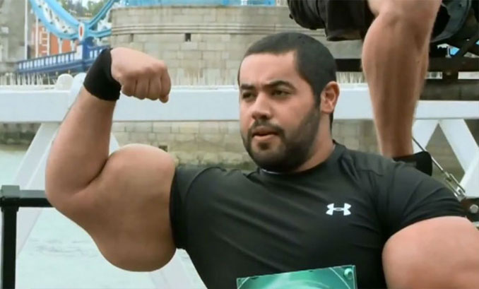 Moustafa Ismail man with biggest arms in the world - 10 real people you have to see to believe.
