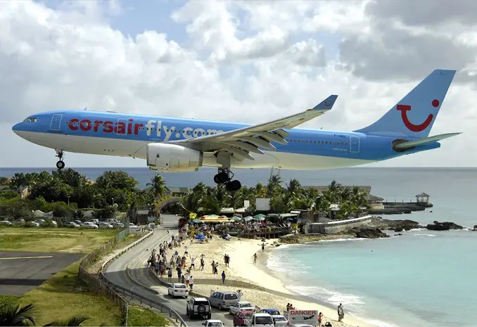 A plane landing at Maho beach - 10 photos you won't believe weren't photoshopped.