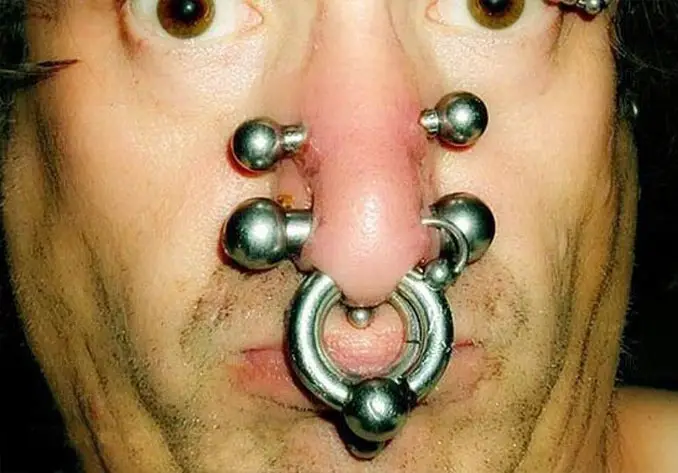 Man with many nose piercings - 10 Most Insane Body Modifications You Just Have To See