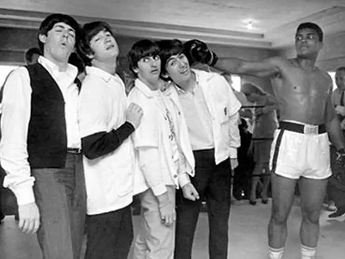 A photo of Muhammad Ali posing with The Beatles - 10 Rare Photos From History