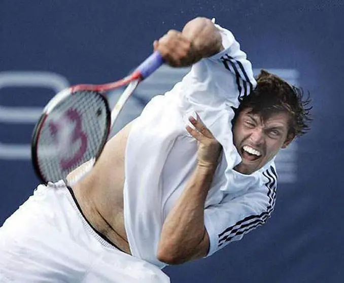 A photo of a tennis player derping out - 10 Amazing Photos Taken At Just The Right Time