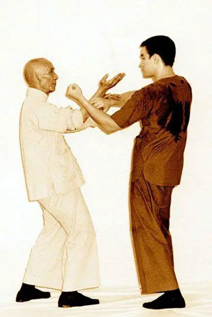 Bruce Lee training with Ip Man.