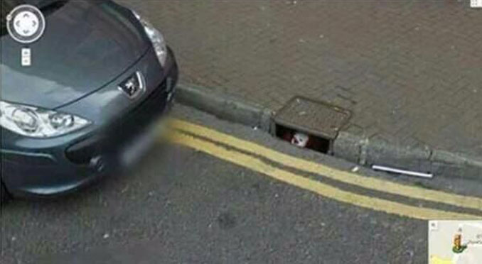 A clown in the sewer seen on Google Street View.