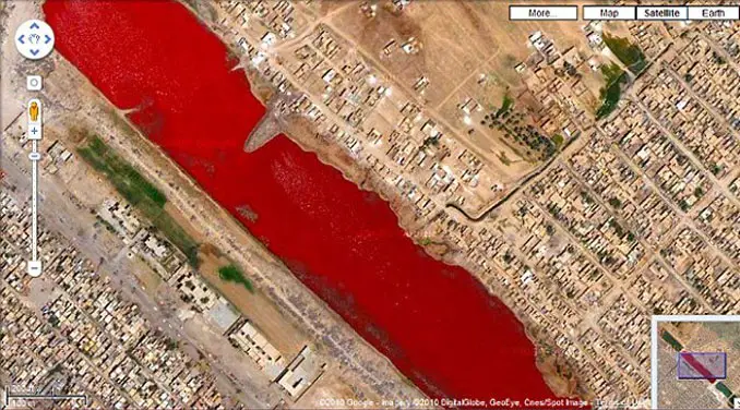 A blood red river near Sadr City, Iraq seen on Google Maps.