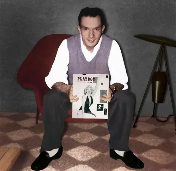 Hugh Hefner holding the first issue of Playboy Magazine.