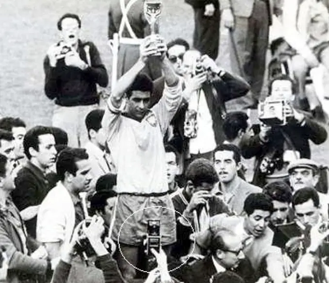 Man with cell phone at the 1962 FIFA World Cup - 10 REAL Cases Of Time Travel That Cannot Be Explained