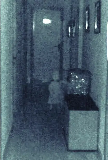 Ghost girl in hallway of town hall in Vegas del Genil, Spain - 10 Photos of Ghost Children That Have Everyone Scared