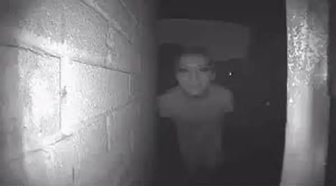 Creepy photo from Reddit of a man standing at the door - 10 Creepiest Doorbell Camera Videos Ever Captured