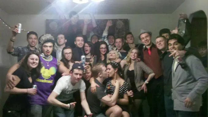 Unknown guest appears in group photo - These Creepy Photos Cannot be Explained