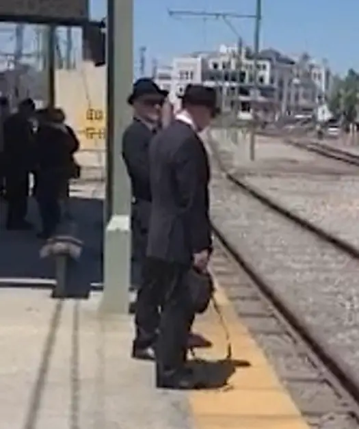 Photo of the Men in Black near the Bienville Street station outside the French Quarter in New Orleans, Louisiana - Real Men in Black Sightings Caught on Camera