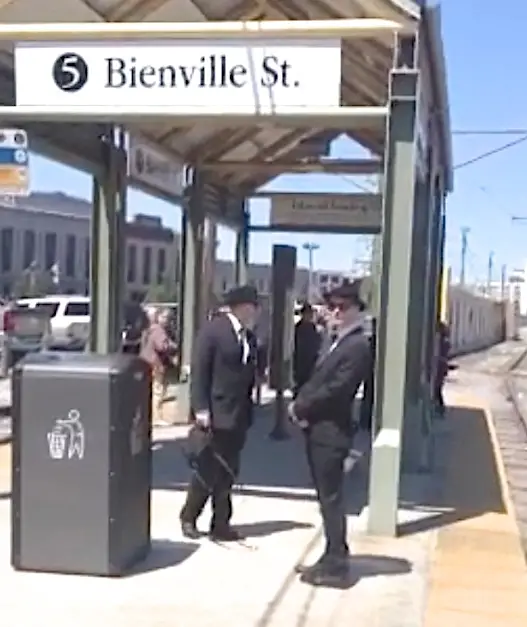 Image of the Men in Black near the Bienville Street station outside the French Quarter in New Orleans, Louisiana - Real Men in Black Sightings Caught on Camera