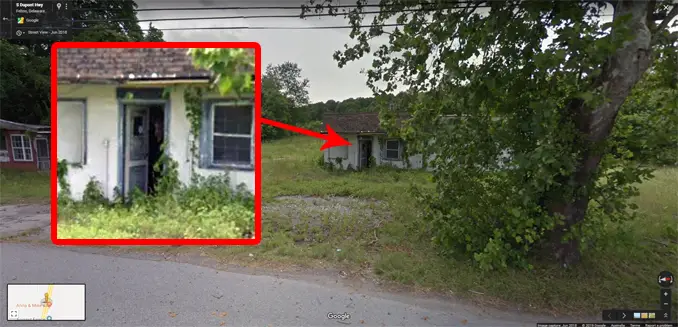 Scary picture of a face in a shack on Google maps