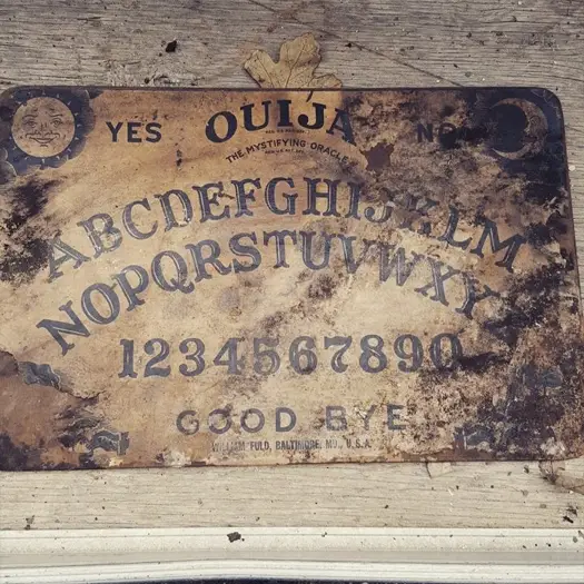 A ouija board is one of the scariest things discovered inside walls.