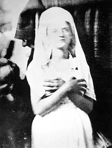 A black and white photo of the spirit of Katie King, one of the world's most famous paranormal mysteries.