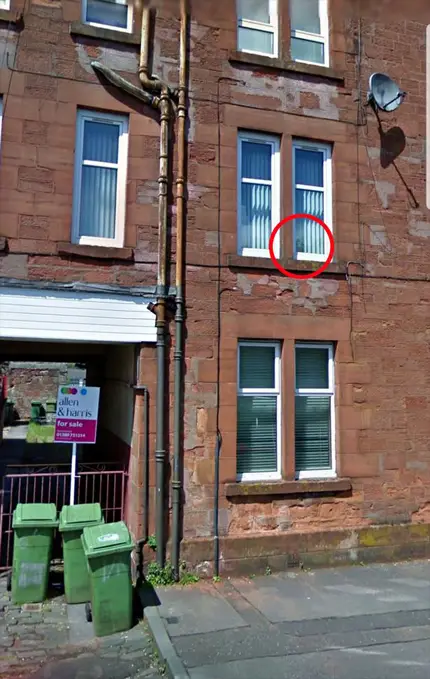 Ghost spotted in a window on Google Street View.