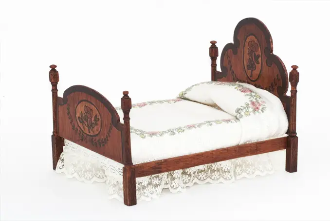 An illustration of a vintage bed.