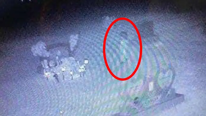 Scary ghost photos show a little deceased girl at her own grave. 