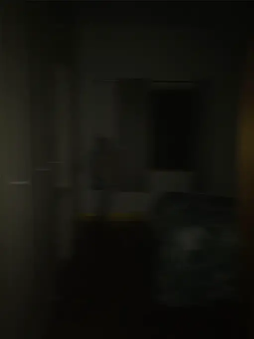 Photo of a ghostly figure in the darkness.